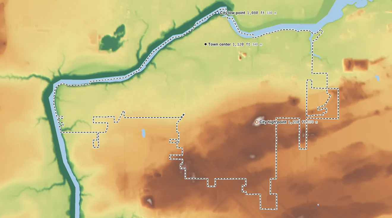 Topographic elevation map of International Falls, Minnesota, shaded from 1,080 ft near the middle to 1,210 ft on the southeast side