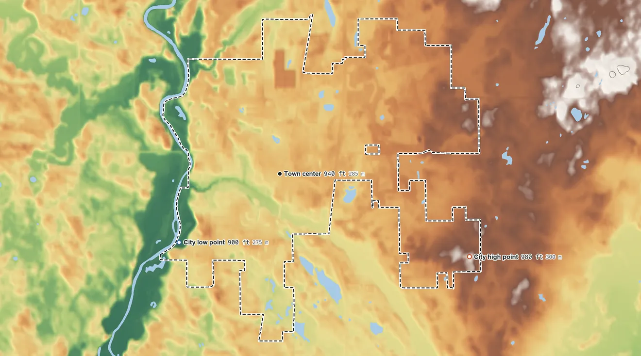 Topographic elevation map of Isanti, Minnesota, shaded from 900 ft on the southwest side to 980 ft on the southeast side