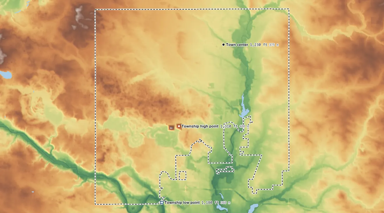 Topographic elevation map of Lansing Township, Minnesota, shaded from 1,180 ft on the south side to 1,310 ft on the southwest side