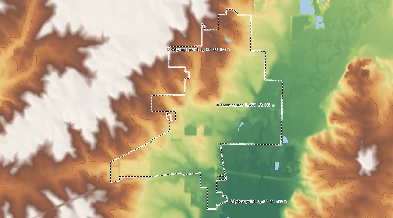 Topographic elevation map of Luverne, Minnesota, shaded from 1,430 ft on the south side to 1,540 ft on the northwest side