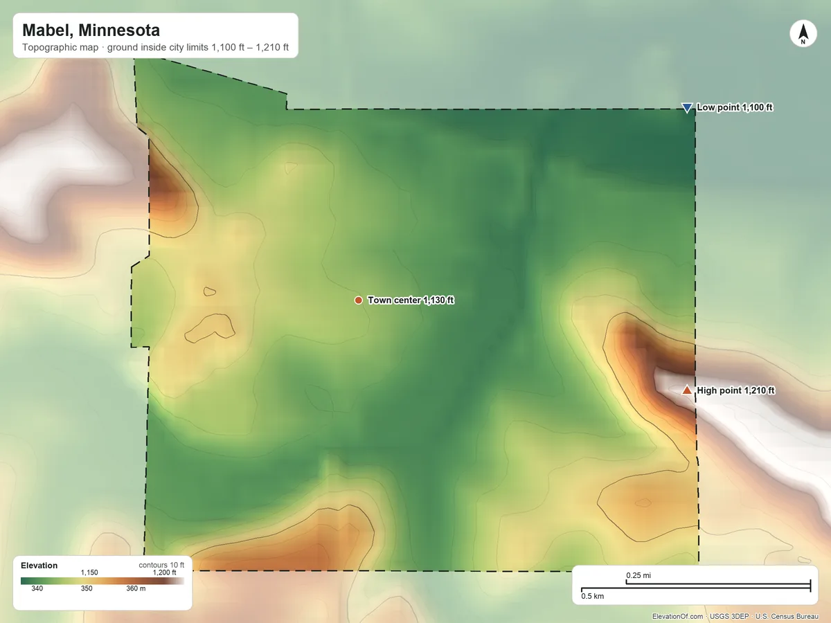Topographic elevation map of Mabel, Minnesota, shaded from 1,100 ft on the northeast side to 1,210 ft on the east side