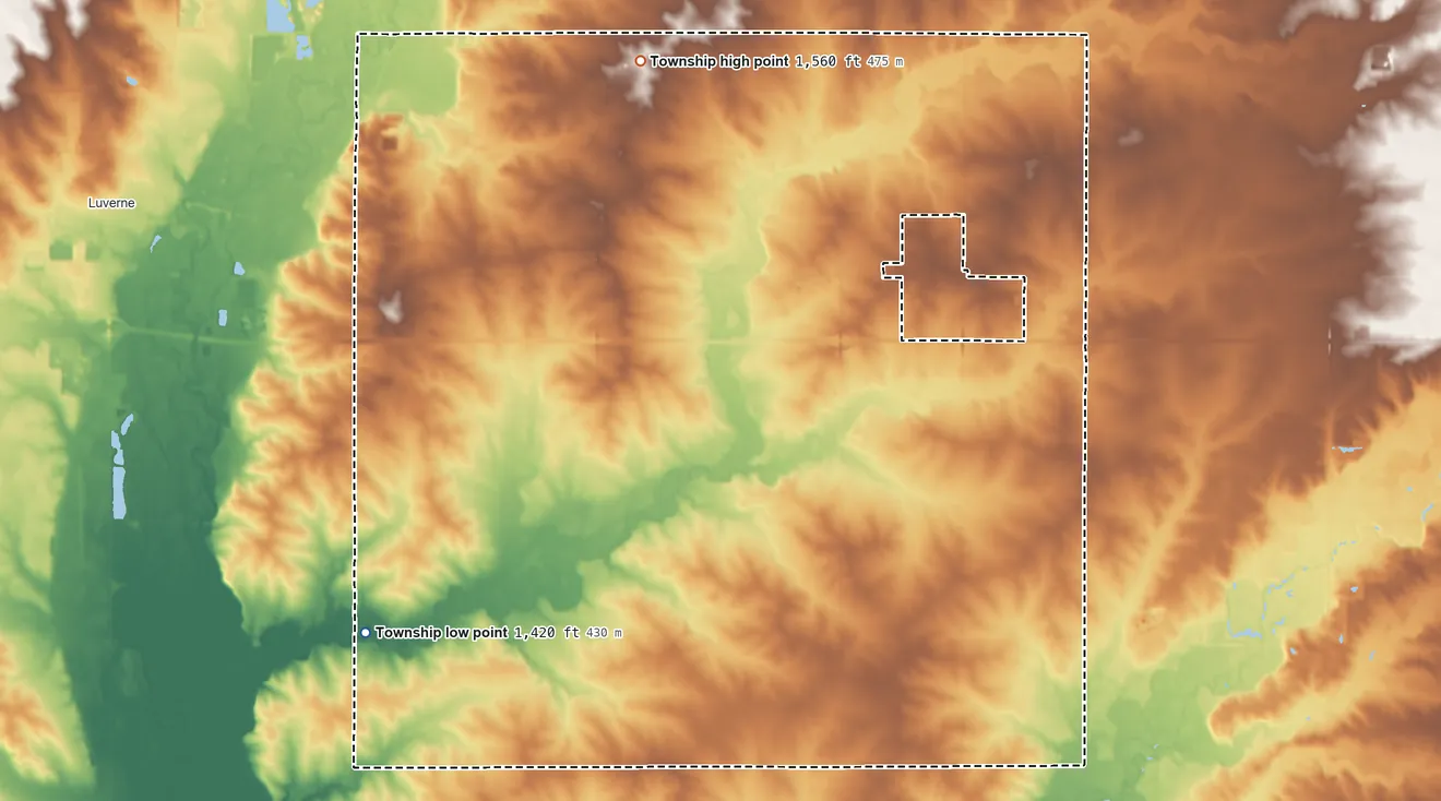 Topographic elevation map of Magnolia Township, Minnesota, shaded from 1,420 ft on the southwest side to 1,560 ft on the north side