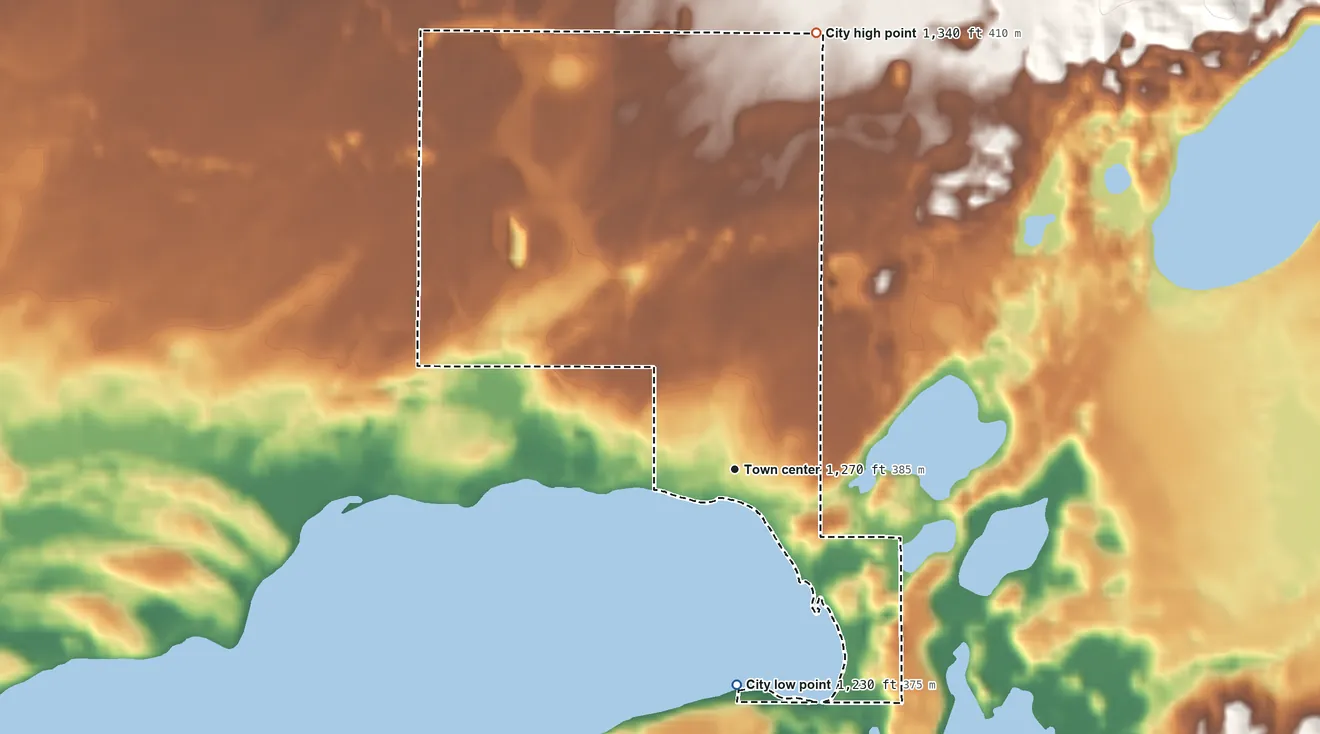 Topographic elevation map of Manhattan Beach, Minnesota, shaded from 1,230 ft on the south side to 1,340 ft on the north side