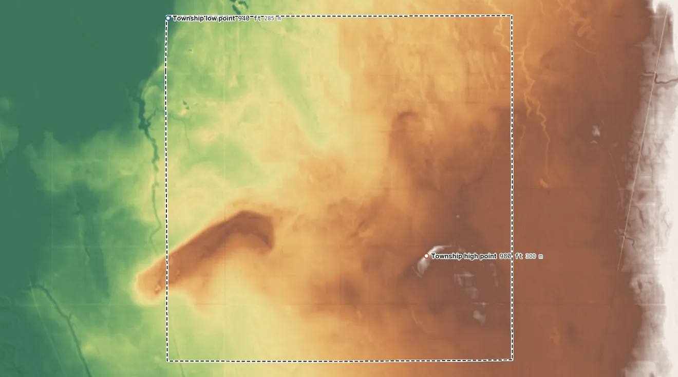 Topographic elevation map of Mitchell Township, Minnesota, shaded from 940 ft on the northwest side to 980 ft on the southeast side