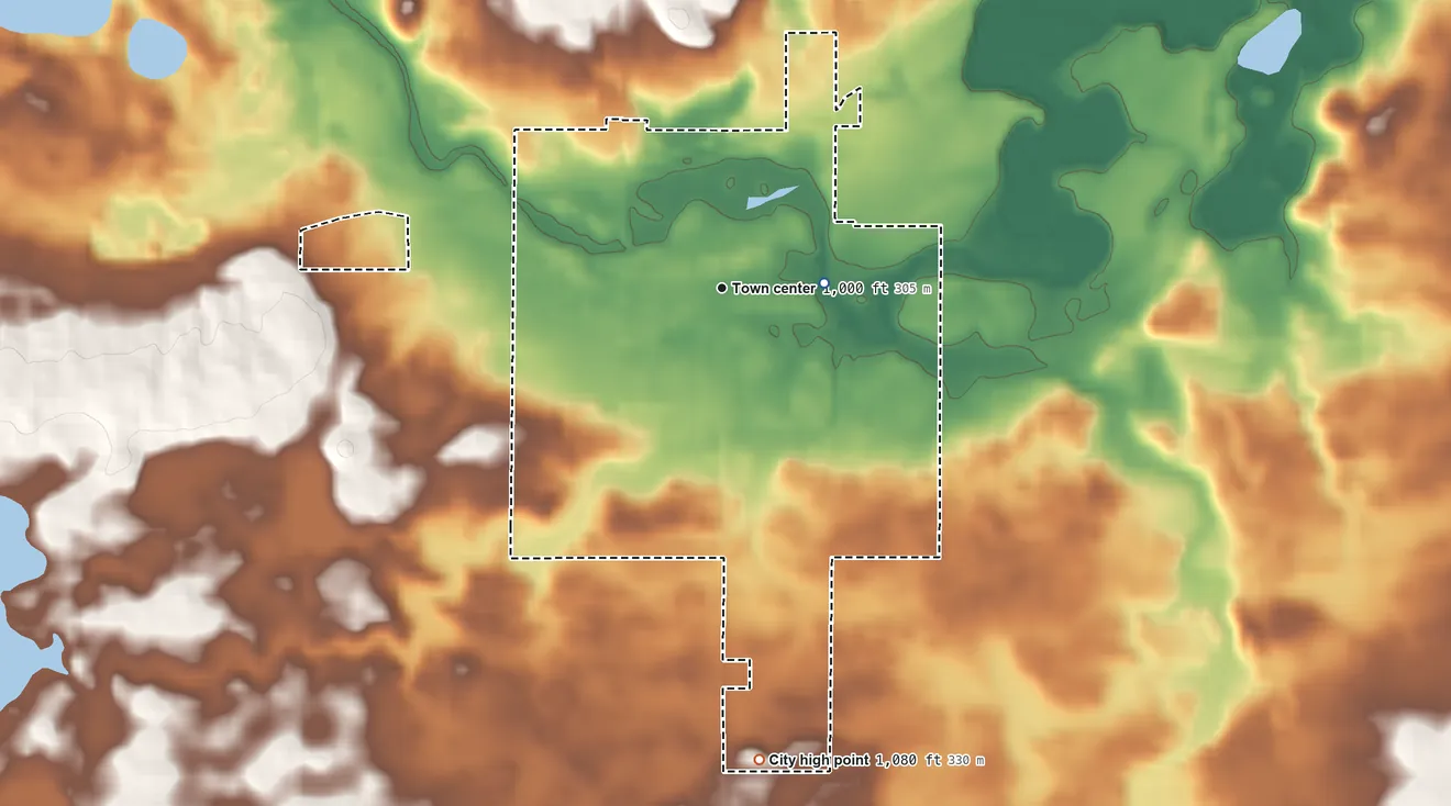Topographic elevation map of Morristown, Minnesota, shaded from 990 ft on the east side to 1,080 ft on the south side