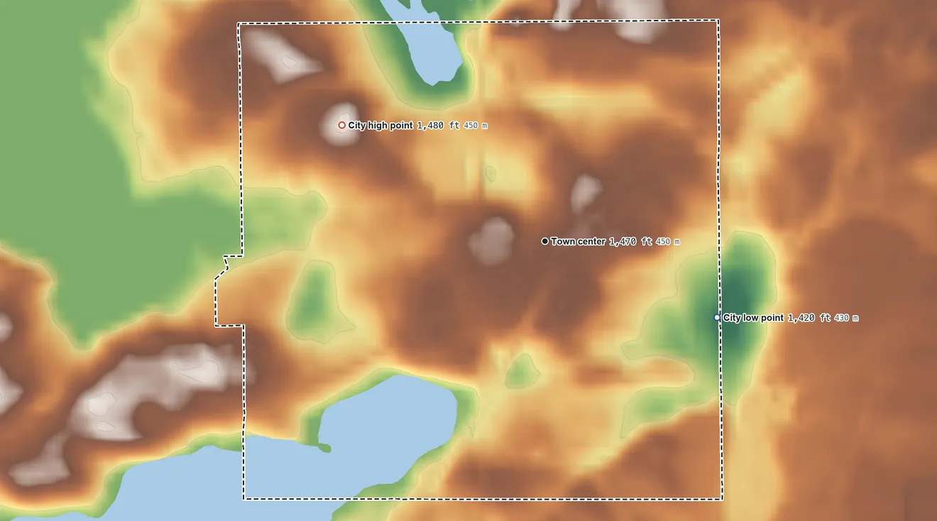 Topographic elevation map of Nevis, Minnesota, shaded from 1,420 ft on the southeast side to 1,480 ft on the northwest side