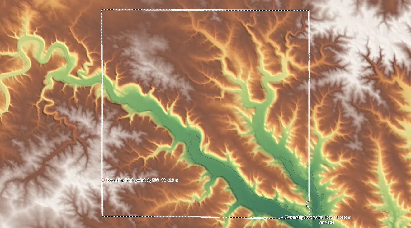 Topographic elevation map of Orion Township, Minnesota, shaded from 960 ft on the southeast side to 1,330 ft on the southwest side