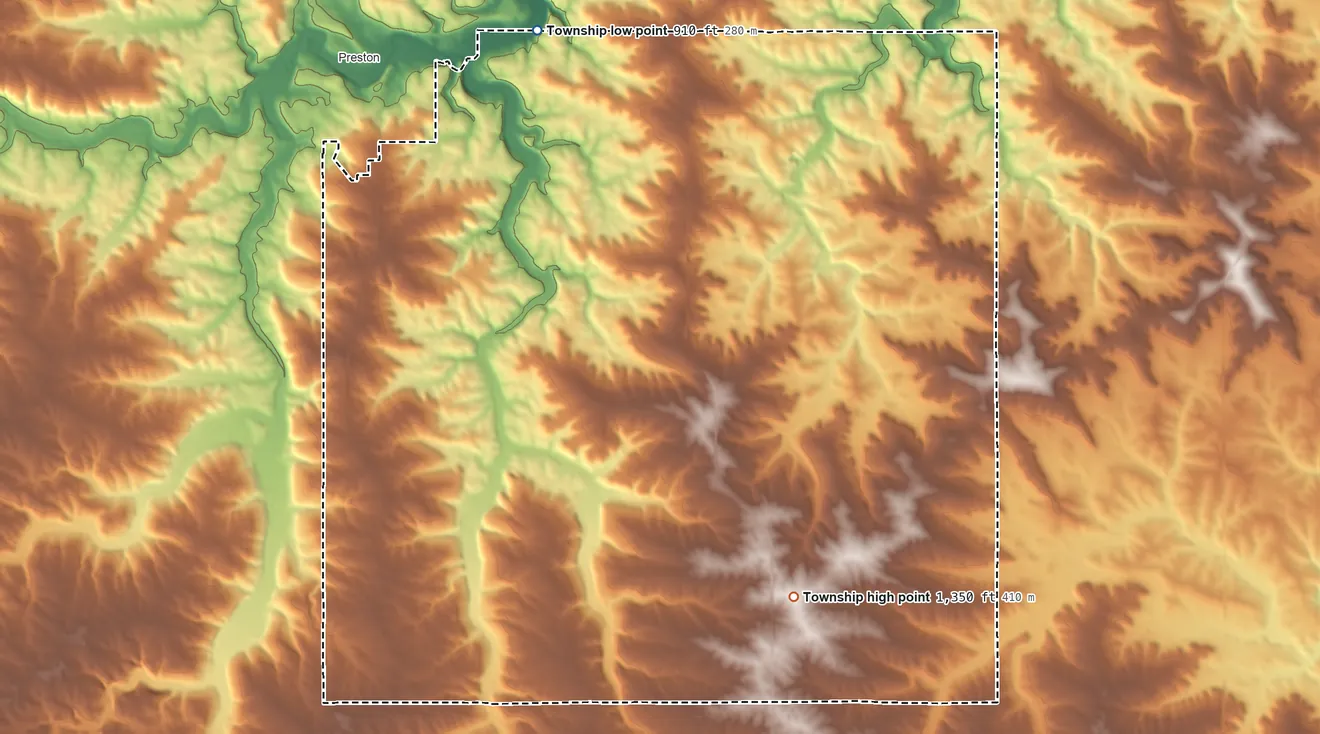 Topographic elevation map of Preston Township, Minnesota, shaded from 910 ft on the northwest side to 1,350 ft on the south side