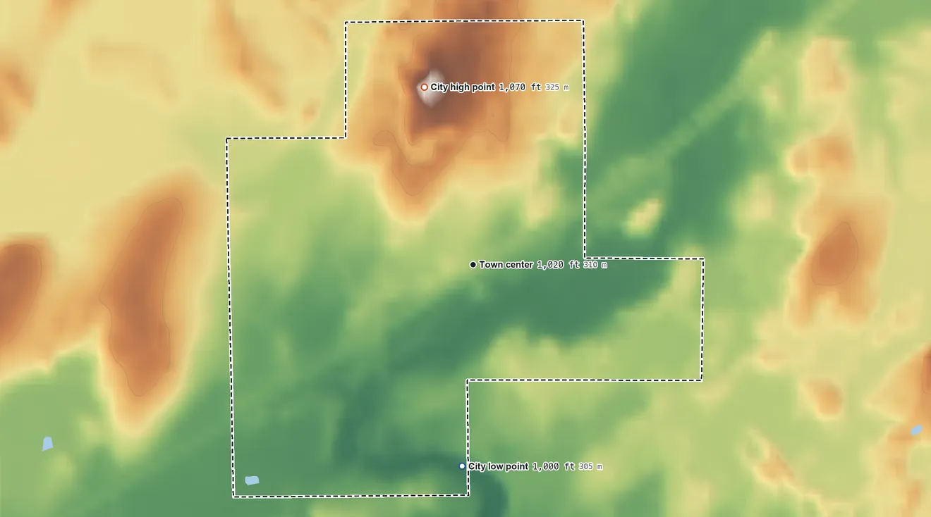 Topographic elevation map of Quamba, Minnesota, shaded from 1,000 ft on the south side to 1,070 ft on the north side