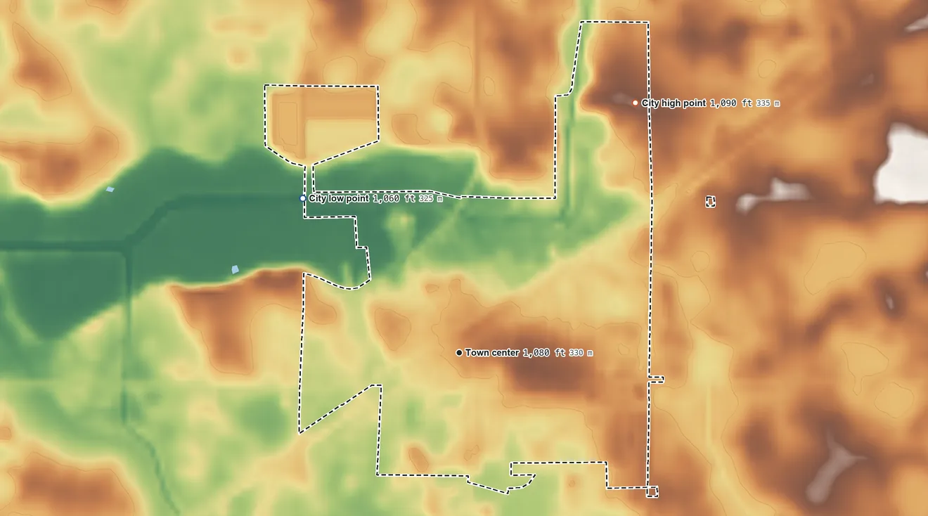 Topographic elevation map of Raymond, Minnesota, shaded from 1,060 ft on the northwest side to 1,090 ft on the northeast side