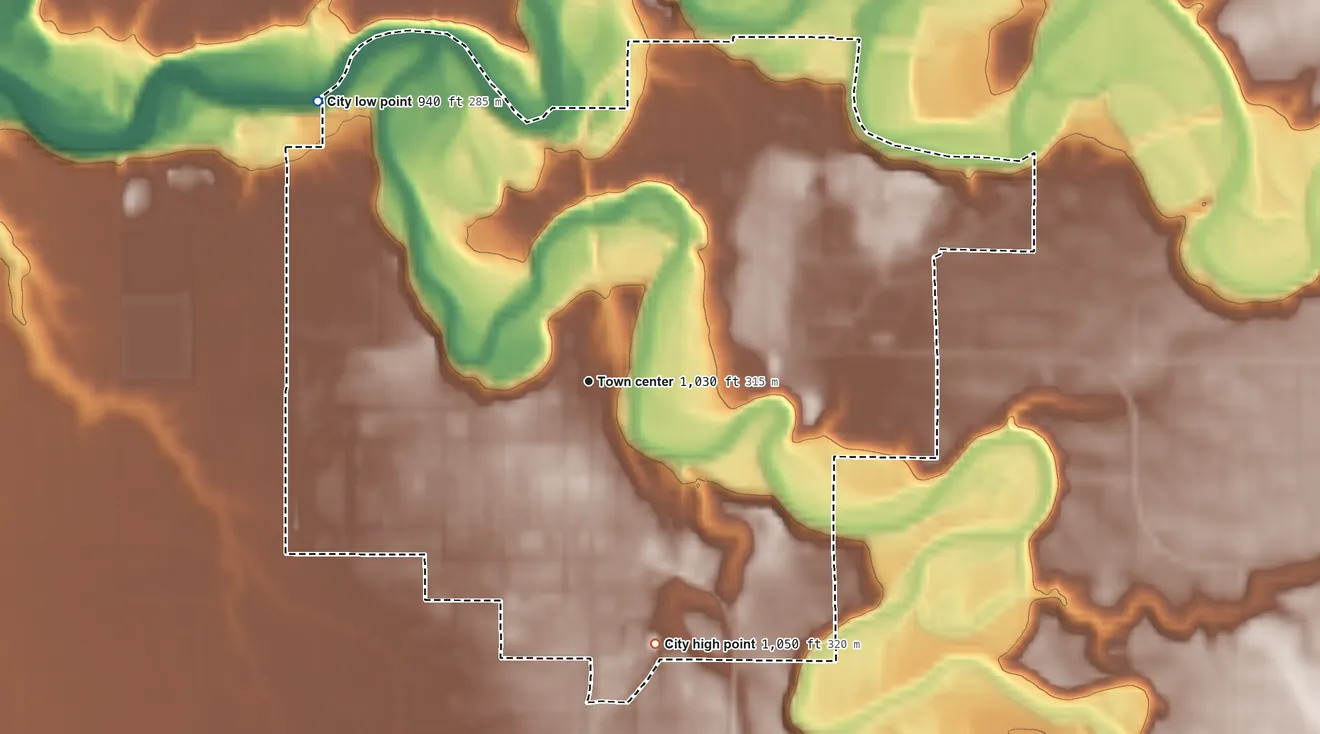 Topographic elevation map of Red Lake Falls, Minnesota, shaded from 940 ft on the northwest side to 1,050 ft on the south side