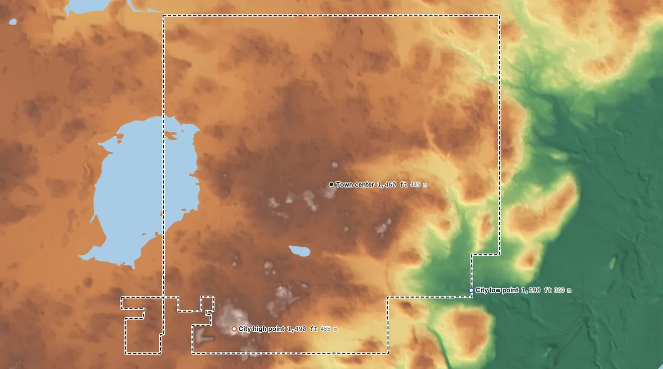 Topographic elevation map of Rice Lake, Minnesota, shaded from 1,190 ft on the southeast side to 1,490 ft on the southwest side