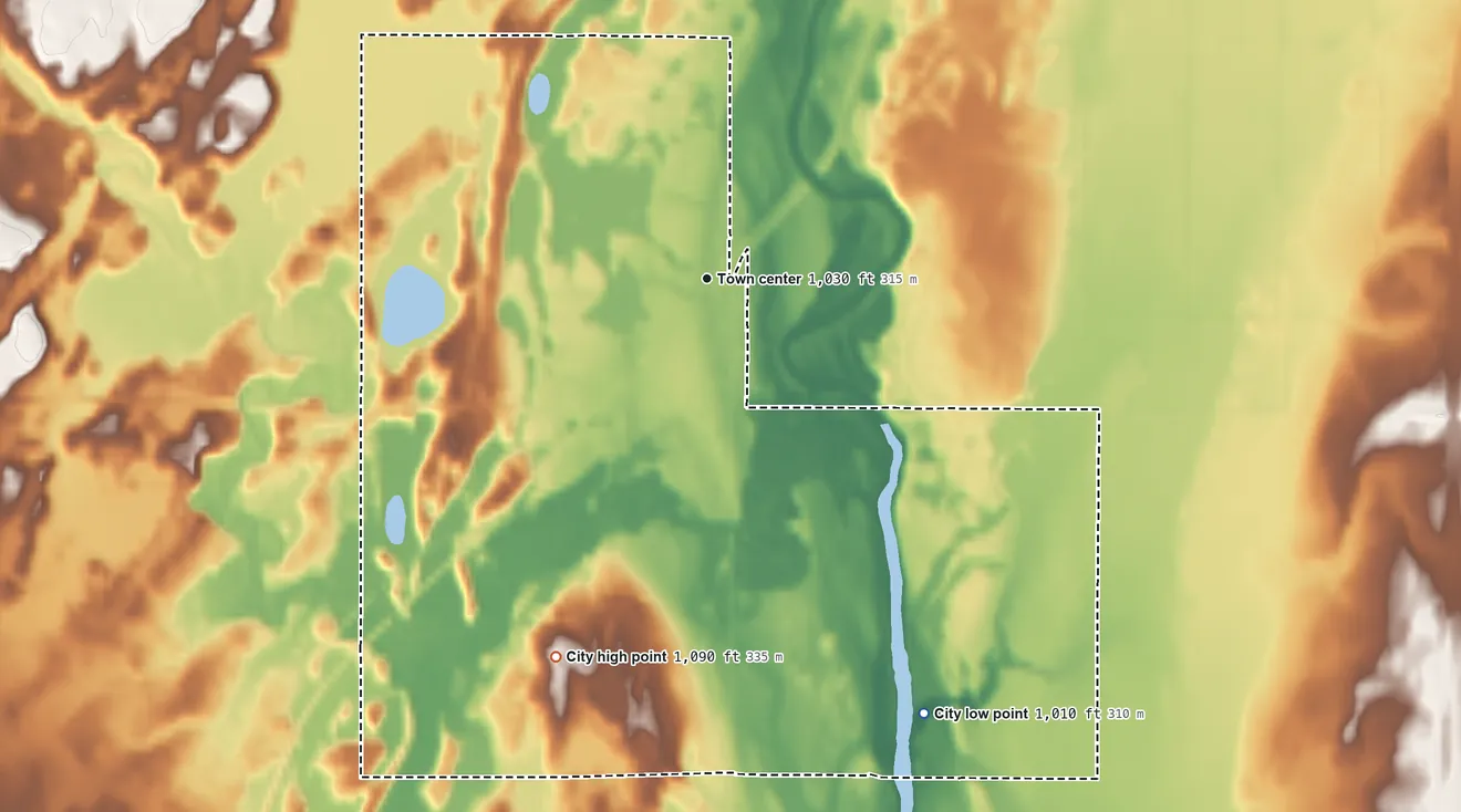Topographic elevation map of Rutledge, Minnesota, shaded from 1,010 ft on the southeast side to 1,090 ft on the south side