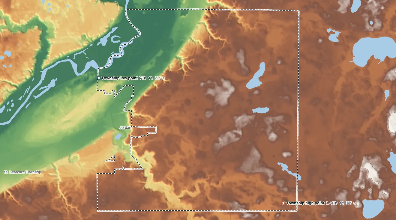 Topographic elevation map of Sand Creek Township, Minnesota, shaded from 710 ft on the northwest side to 1,010 ft on the southeast side