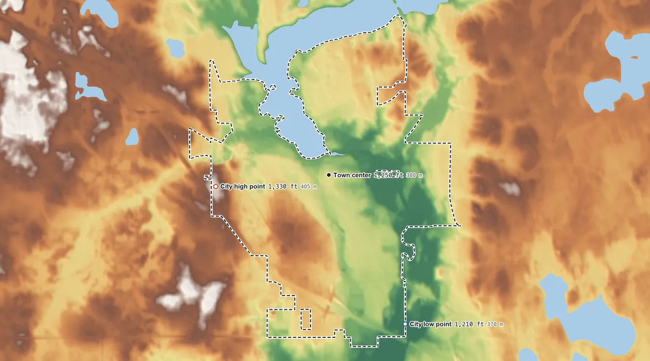 Topographic elevation map of Sauk Centre, Minnesota, shaded from 1,210 ft on the southeast side to 1,330 ft on the west side