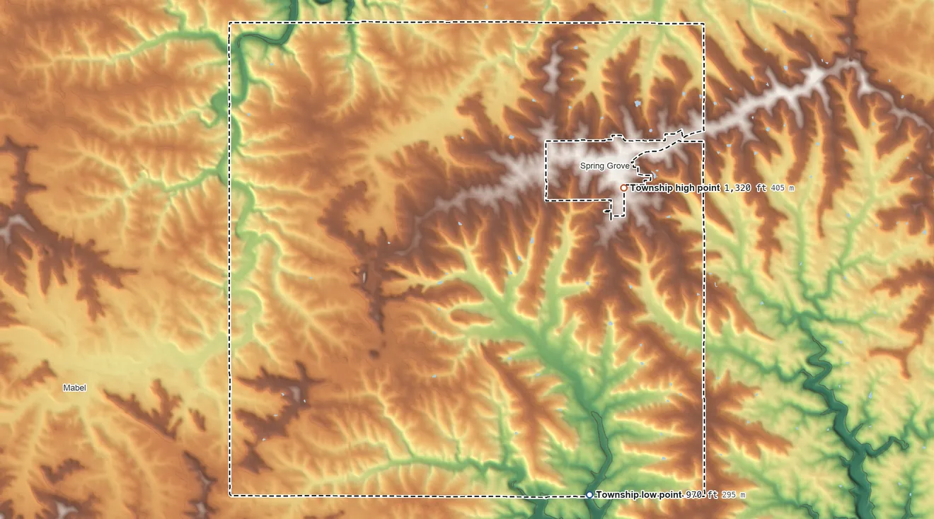 Topographic elevation map of Spring Grove Township, Minnesota, shaded from 970 ft on the south side to 1,320 ft on the northeast side