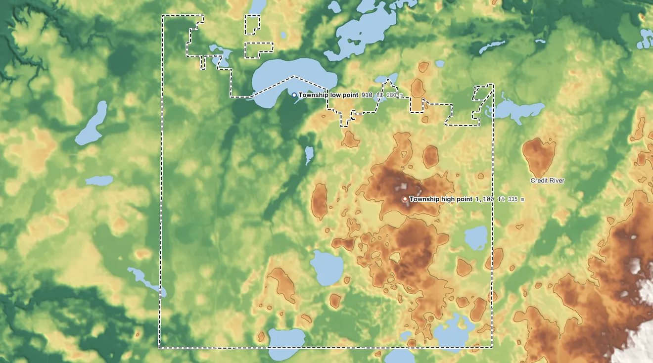 Topographic elevation map of Spring Lake Township, Minnesota, shaded from 910 ft on the north side to 1,100 ft on the east side