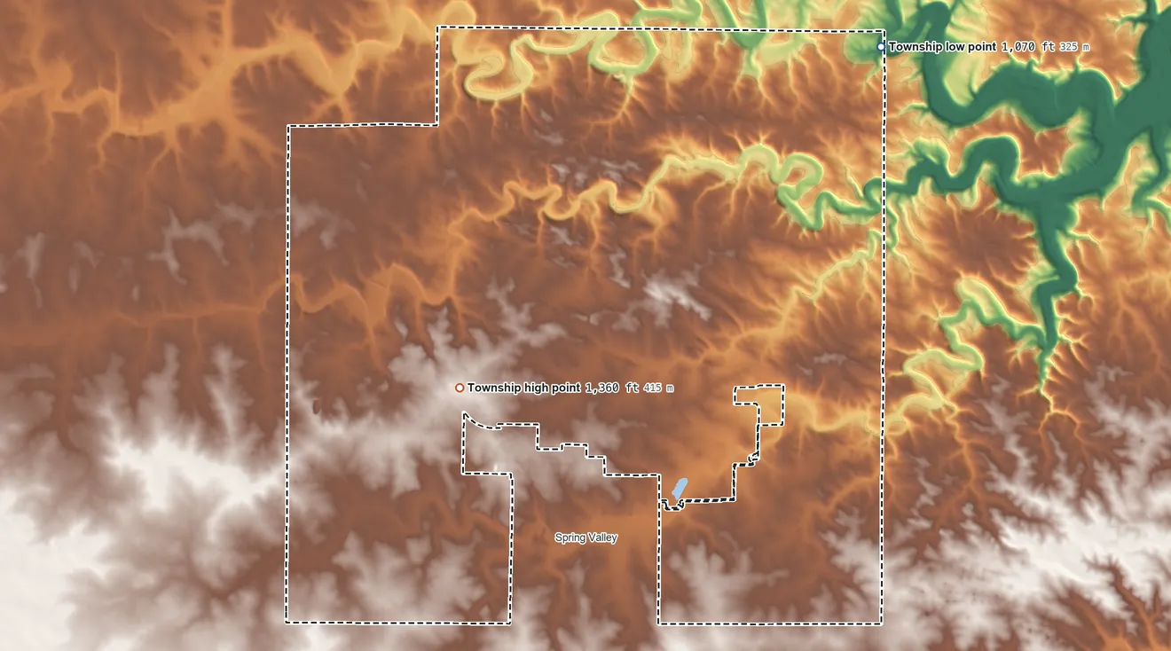 Topographic elevation map of Spring Valley Township, Minnesota, shaded from 1,070 ft on the northeast side to 1,360 ft on the west side
