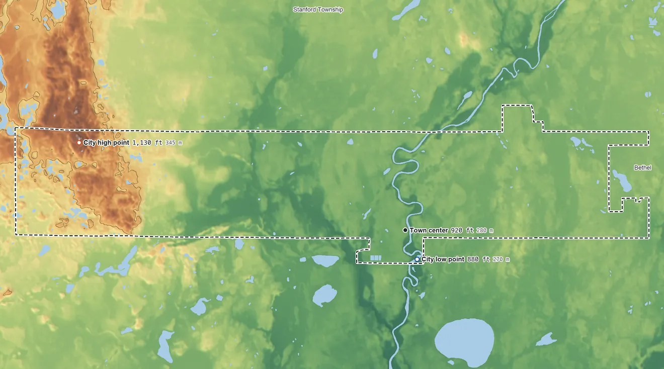 Topographic elevation map of St. Francis, Minnesota, shaded from 880 ft near the middle to 1,130 ft on the west side