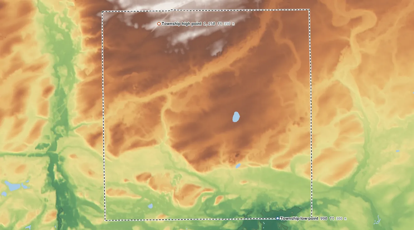 Topographic elevation map of St. George Township, Minnesota, shaded from 990 ft on the southeast side to 1,150 ft on the north side