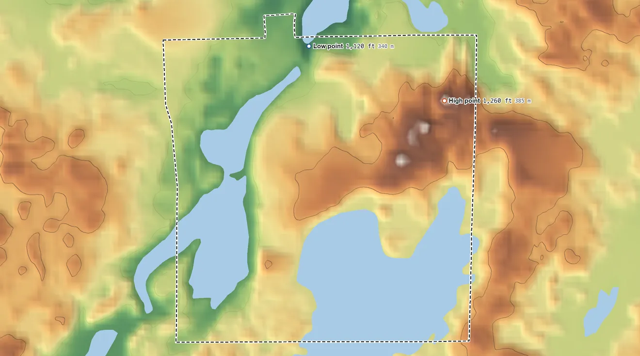 Topographic elevation map of St. John's University, Minnesota, shaded from 1,120 ft on the north side to 1,260 ft on the east side