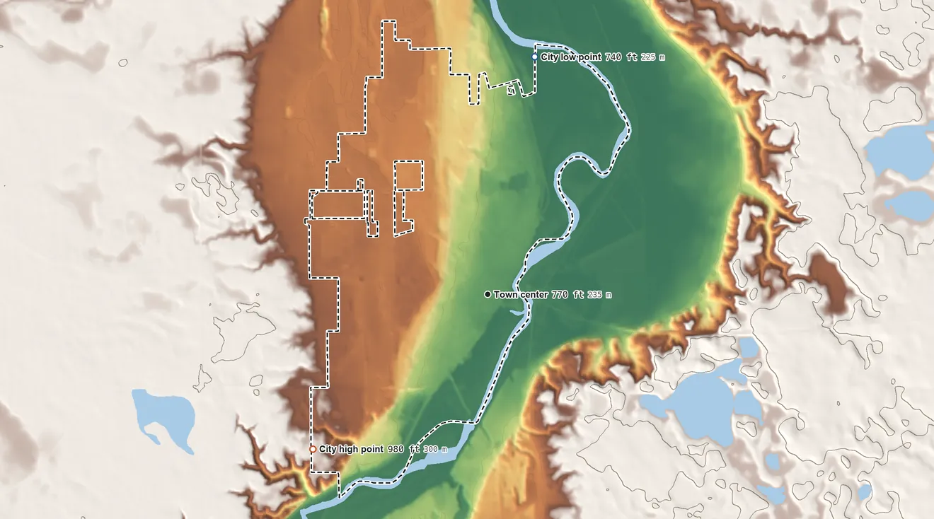 Topographic elevation map of St. Peter, Minnesota, shaded from 740 ft on the north side to 980 ft on the southwest side