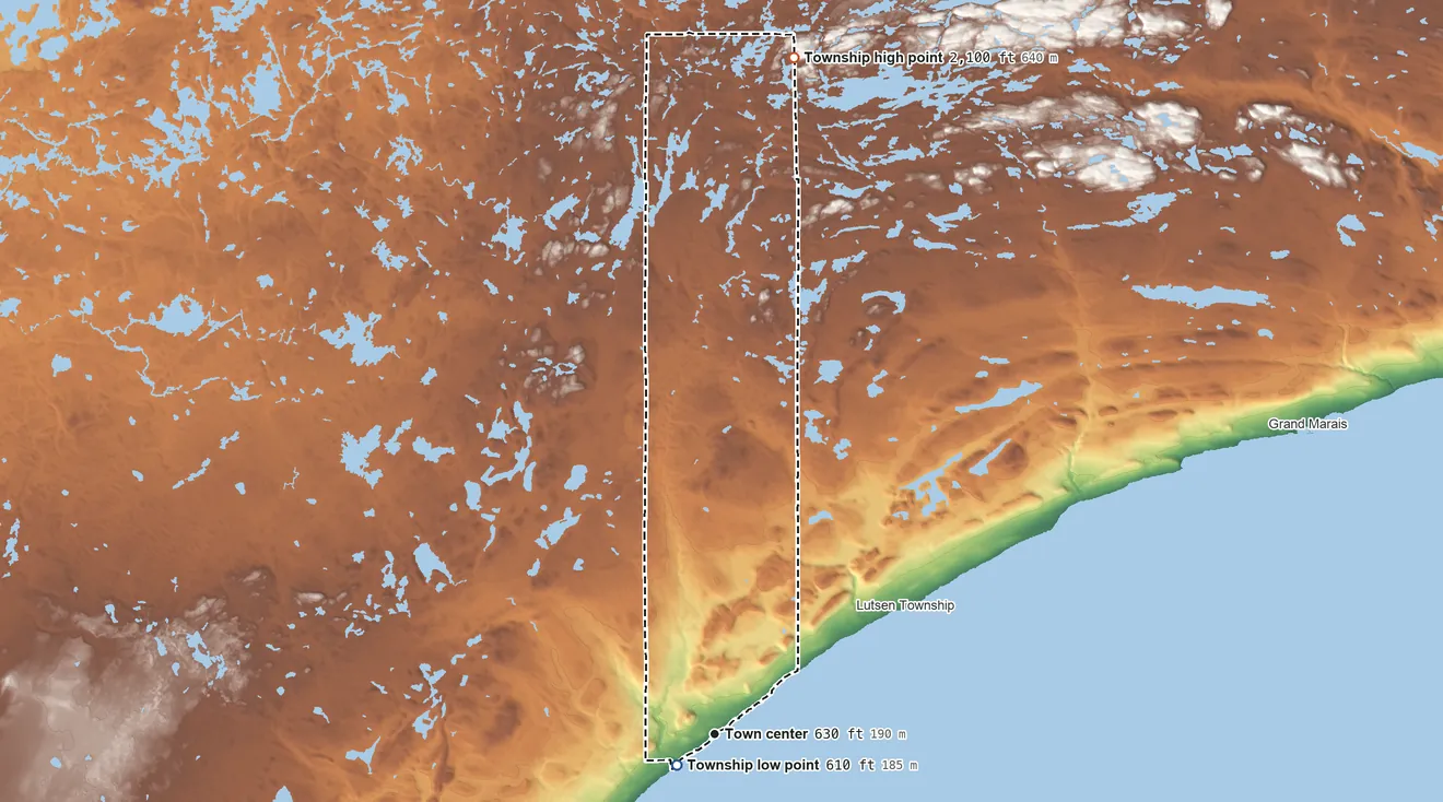 Topographic elevation map of Tofte Township, Minnesota, shaded from 610 ft near the middle to 2,100 ft on the north side
