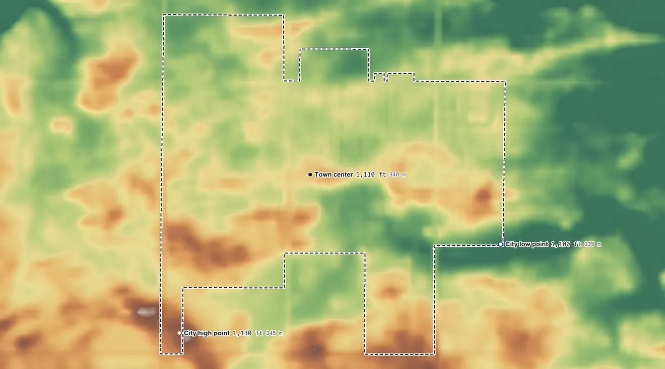 Topographic elevation map of Truman, Minnesota, shaded from 1,100 ft on the east side to 1,130 ft on the southwest side