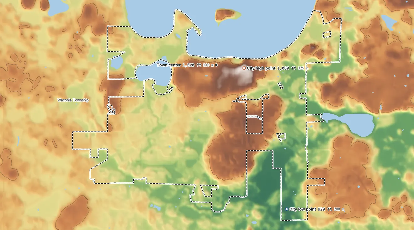 Topographic elevation map of Waconia, Minnesota, shaded from 920 ft on the southeast side to 1,060 ft near the middle