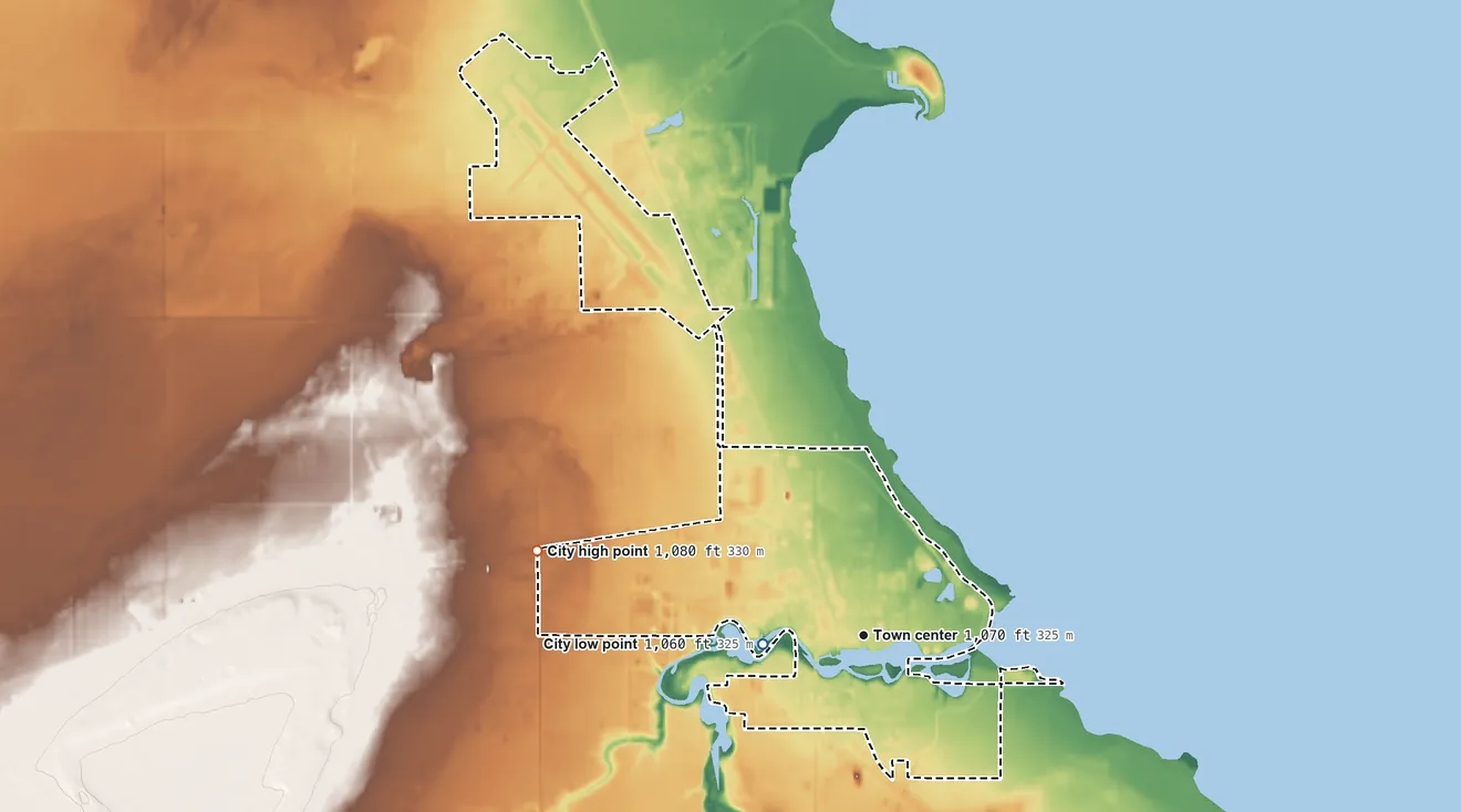 Topographic elevation map of Warroad, Minnesota, shaded from 1,060 ft on the west side to 1,080 ft on the west side