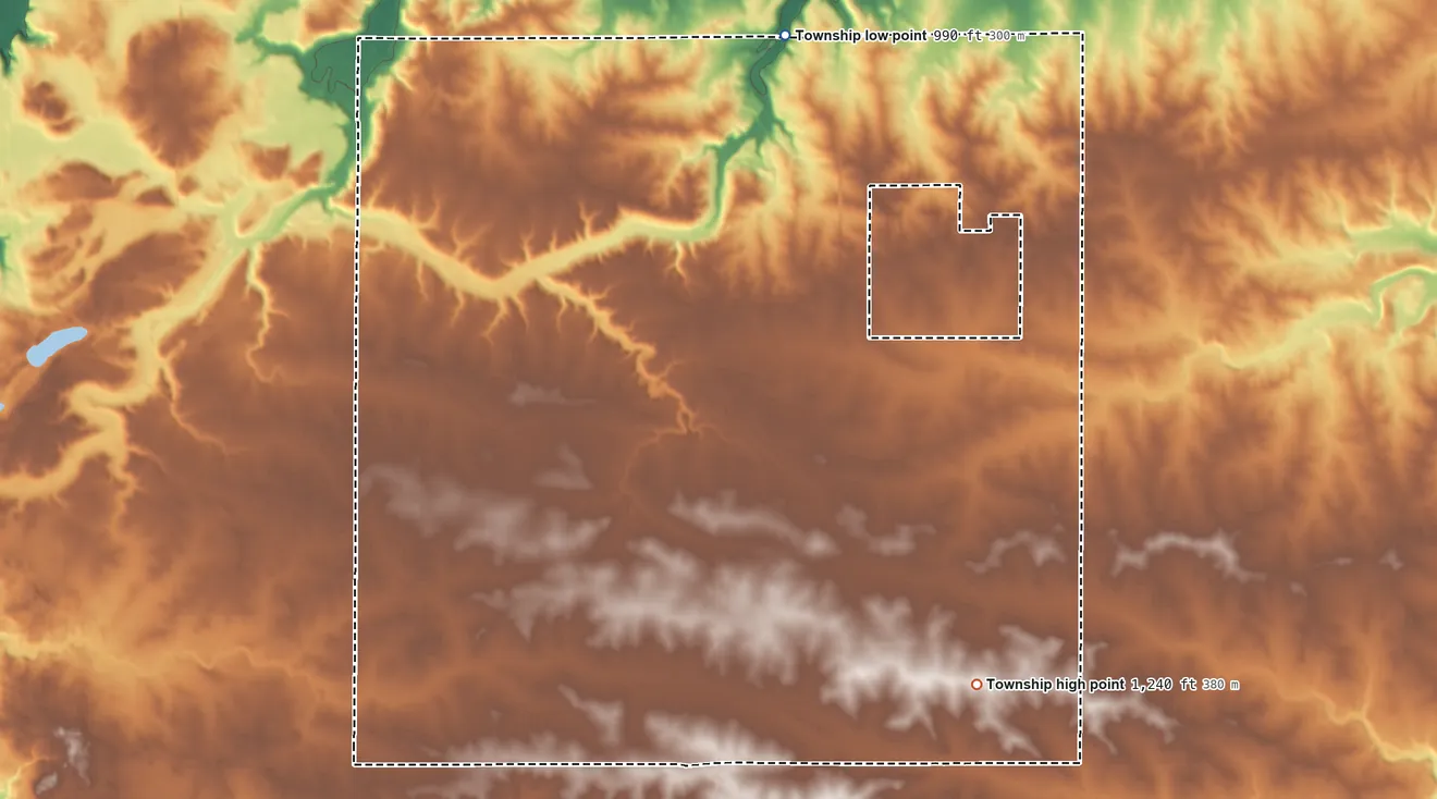 Topographic elevation map of Wheeling Township, Minnesota, shaded from 990 ft on the northeast side to 1,240 ft on the southeast side