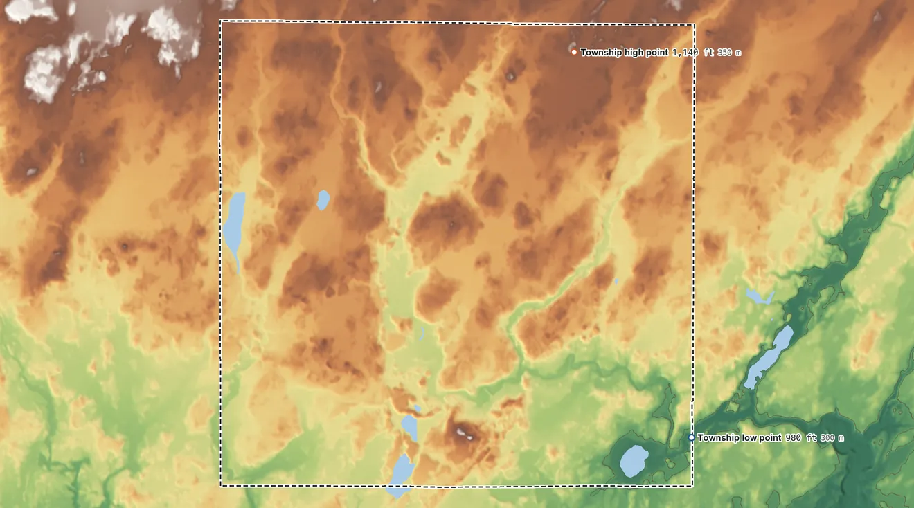 Topographic elevation map of Wilma Township, Minnesota, shaded from 980 ft on the southeast side to 1,140 ft on the northeast side