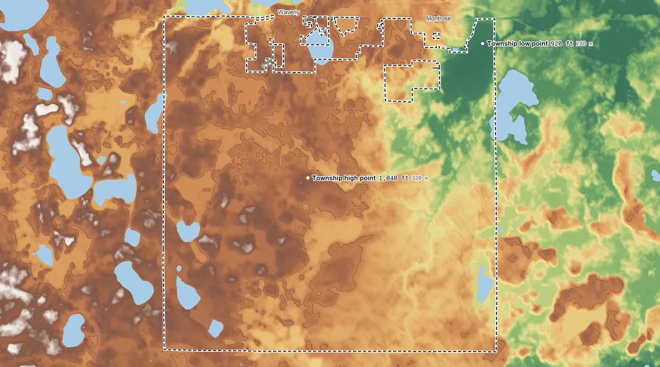 Topographic elevation map of Woodland Township, Minnesota, shaded from 920 ft on the northeast side to 1,040 ft on the northwest side