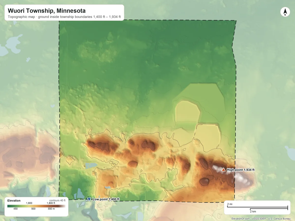 Topographic elevation map of Wuori Township, Minnesota, shaded from 1,400 ft on the south side to 1,934 ft on Pike Mountain