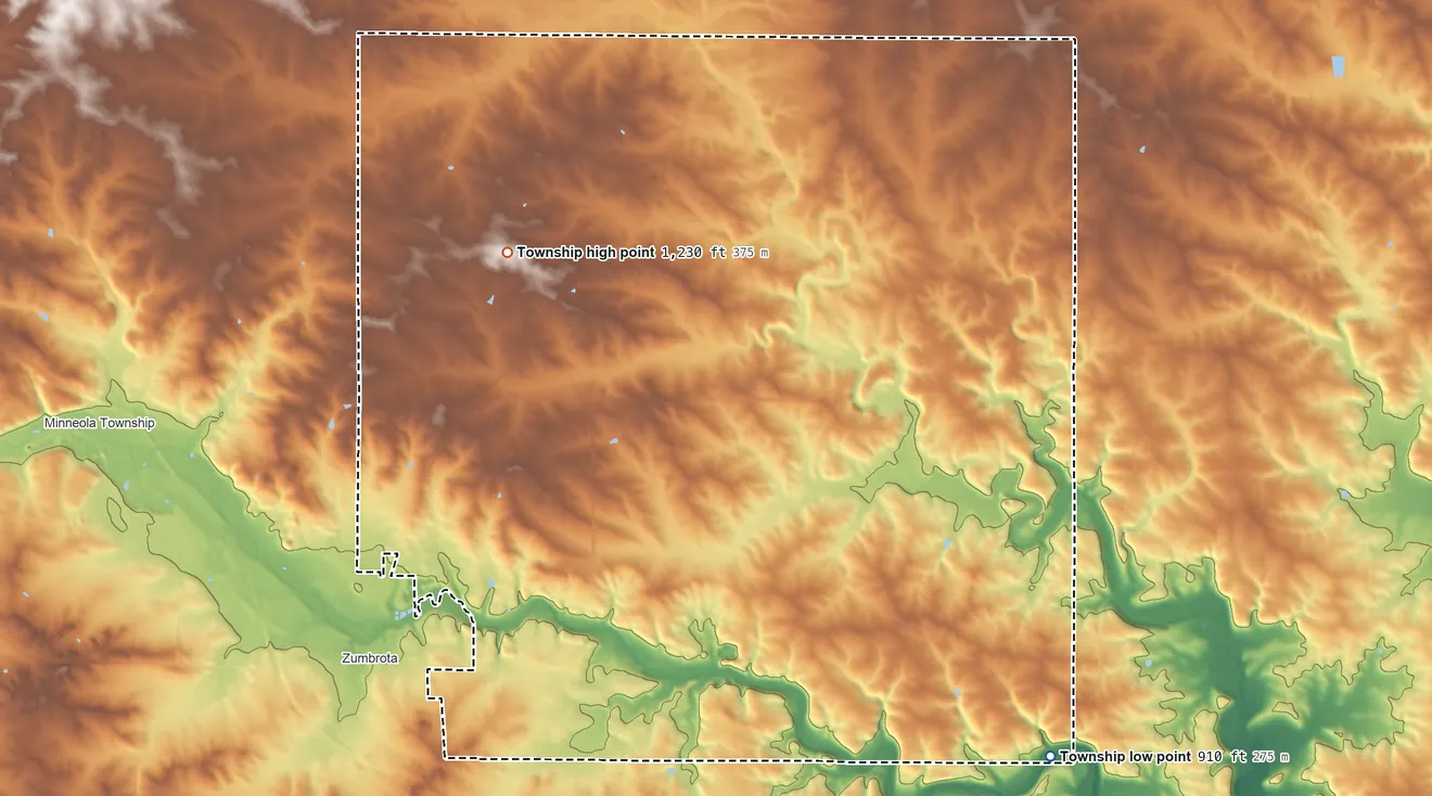 Topographic elevation map of Zumbrota Township, Minnesota, shaded from 910 ft on the southeast side to 1,230 ft on the northwest side