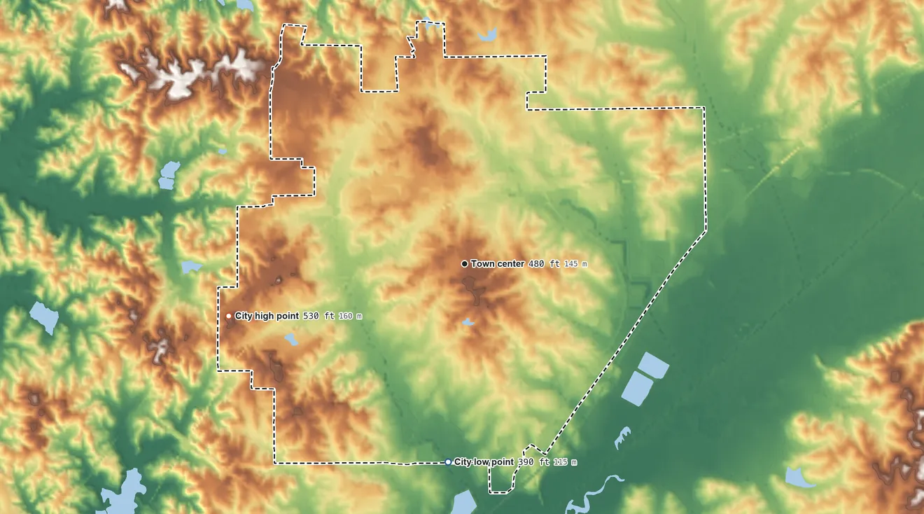 Topographic elevation map of Kosciusko, Mississippi, shaded from 390 ft on the south side to 530 ft on the west side
