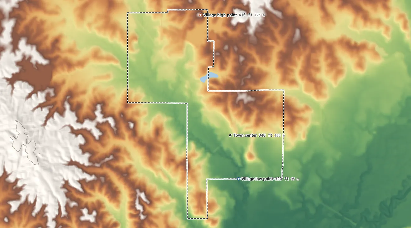 Topographic elevation map of Puckett, Mississippi, shaded from 320 ft on the south side to 410 ft on the north side