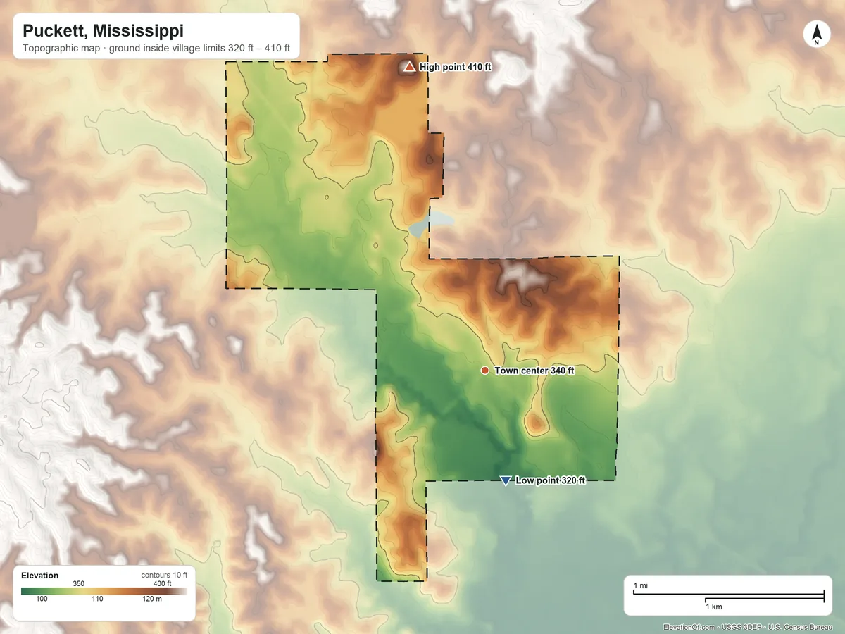 Topographic elevation map of Puckett, Mississippi, shaded from 320 ft on the south side to 410 ft on the north side