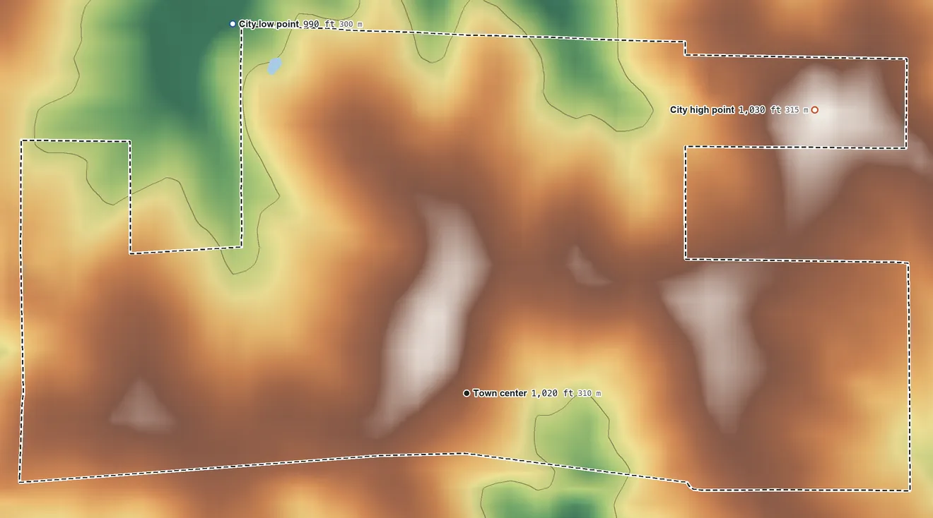 Topographic elevation map of Kidder, Missouri, shaded from 990 ft on the northwest side to 1,030 ft on the northeast side