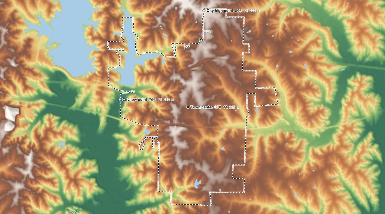 Topographic elevation map of Macon, Missouri, shaded from 760 ft on the west side to 890 ft on the north side