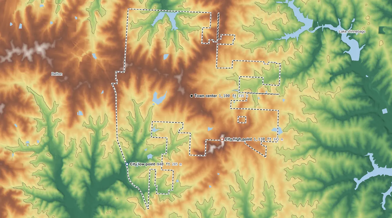 Topographic elevation map of Raymore, Missouri, shaded from 940 ft on the southwest side to 1,130 ft on Miller Hill