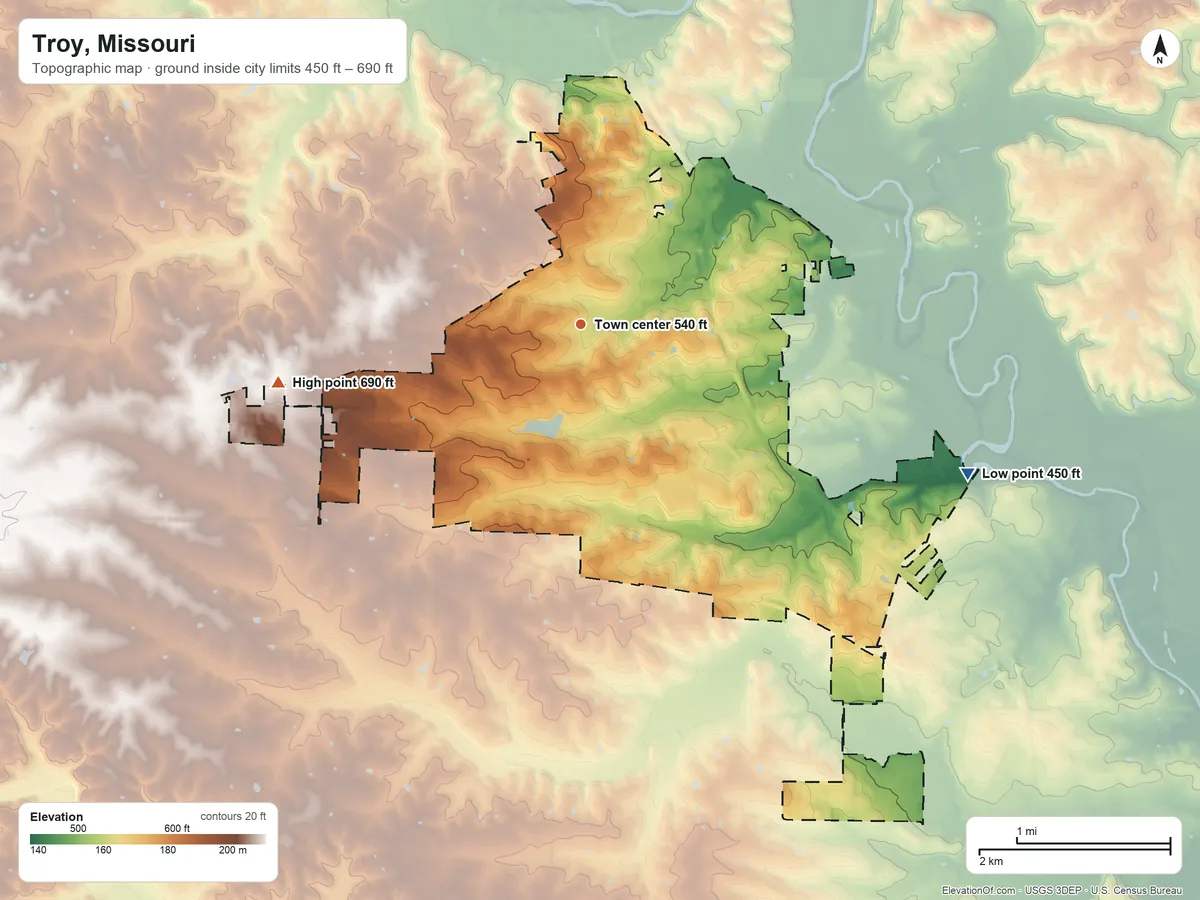 Topographic elevation map of Troy, Missouri, shaded from 450 ft on the east side to 690 ft on the west side