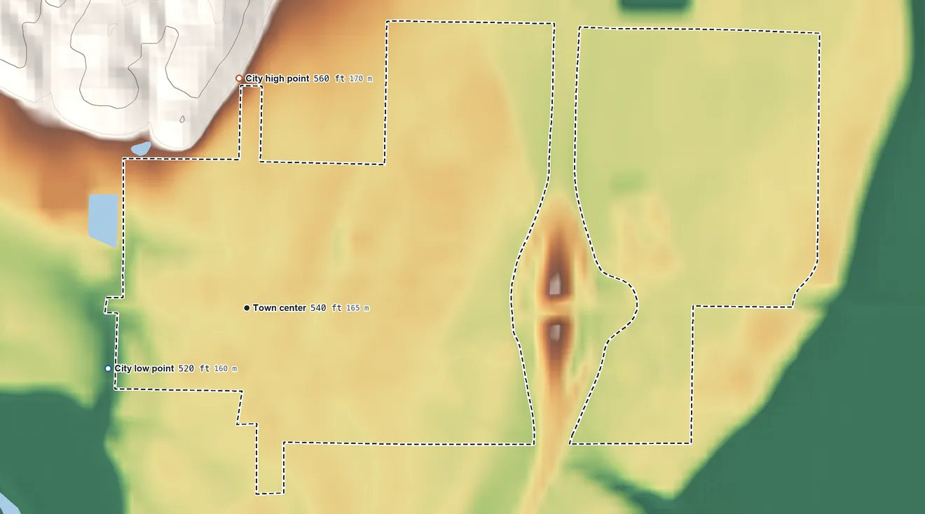 Topographic elevation map of Wayland, Missouri, shaded from 520 ft on the southwest side to 560 ft on the north side