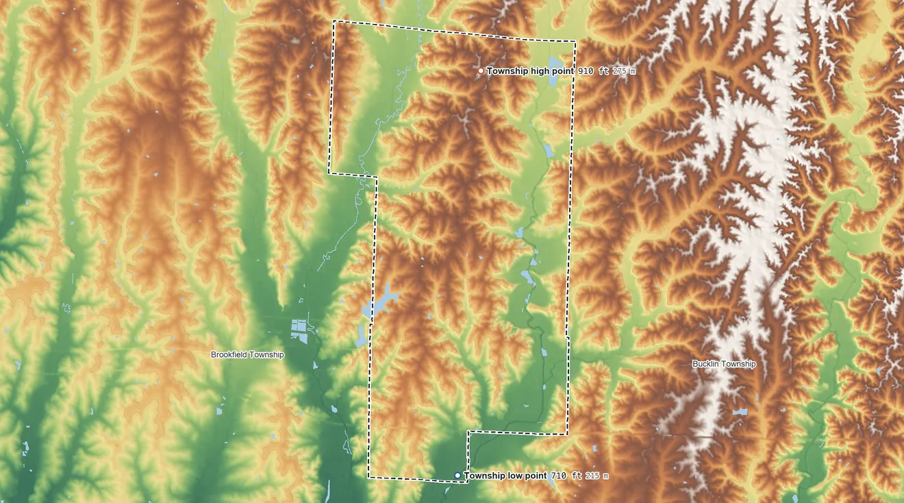 Topographic elevation map of Yellow Creek Township, Missouri, shaded from 710 ft on the south side to 910 ft on the north side