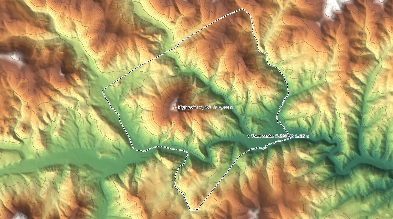 Topographic elevation map of Basin, Montana, shaded from 5,260 ft on the east side to 7,603 ft on Pole Mountain