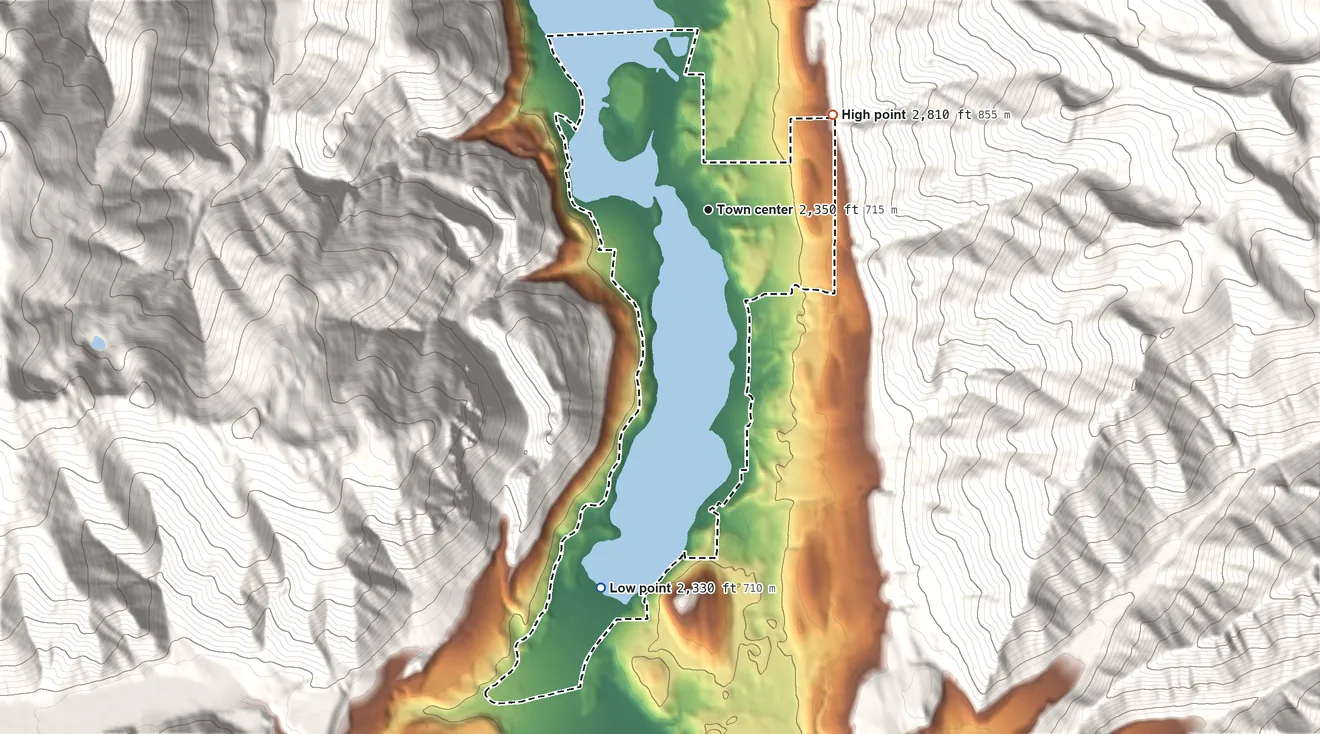 Topographic elevation map of Bull Lake, Montana, shaded from 2,330 ft on the south side to 2,810 ft at the foot of the Cabinet Mountains