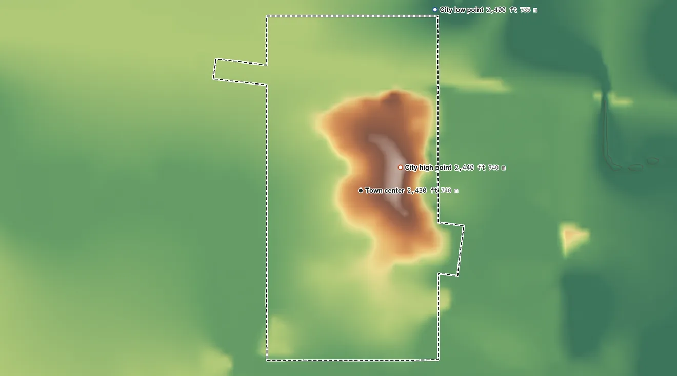 Topographic elevation map of Chinook, Montana, shaded from 2,400 ft on the north side to 2,440 ft on the northeast side
