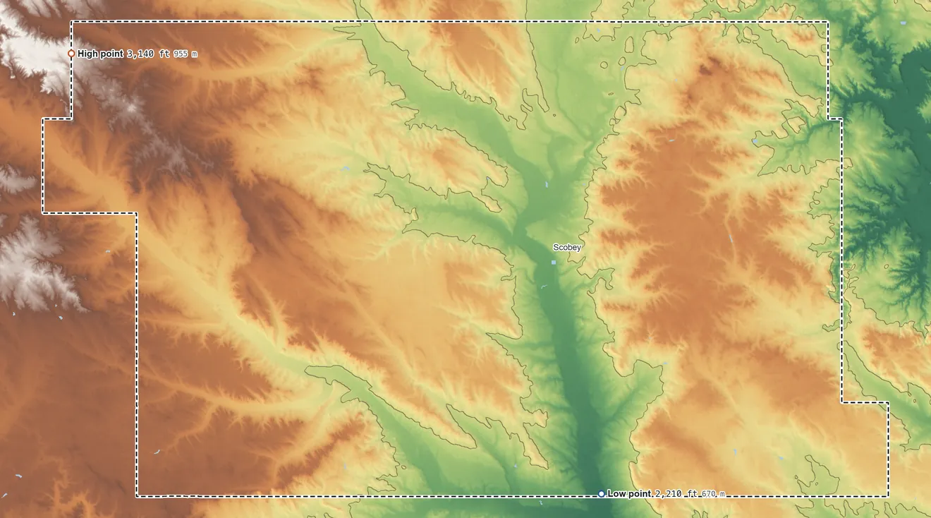 Topographic elevation map of Daniels County, Montana, shaded from 2,210 ft on the southeast side to 3,140 ft on the northwest side