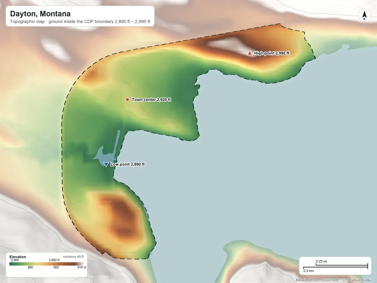Topographic elevation map of Dayton, Montana, shaded from 2,890 ft on the south side to 2,990 ft on the east edge, below higher ground just outside