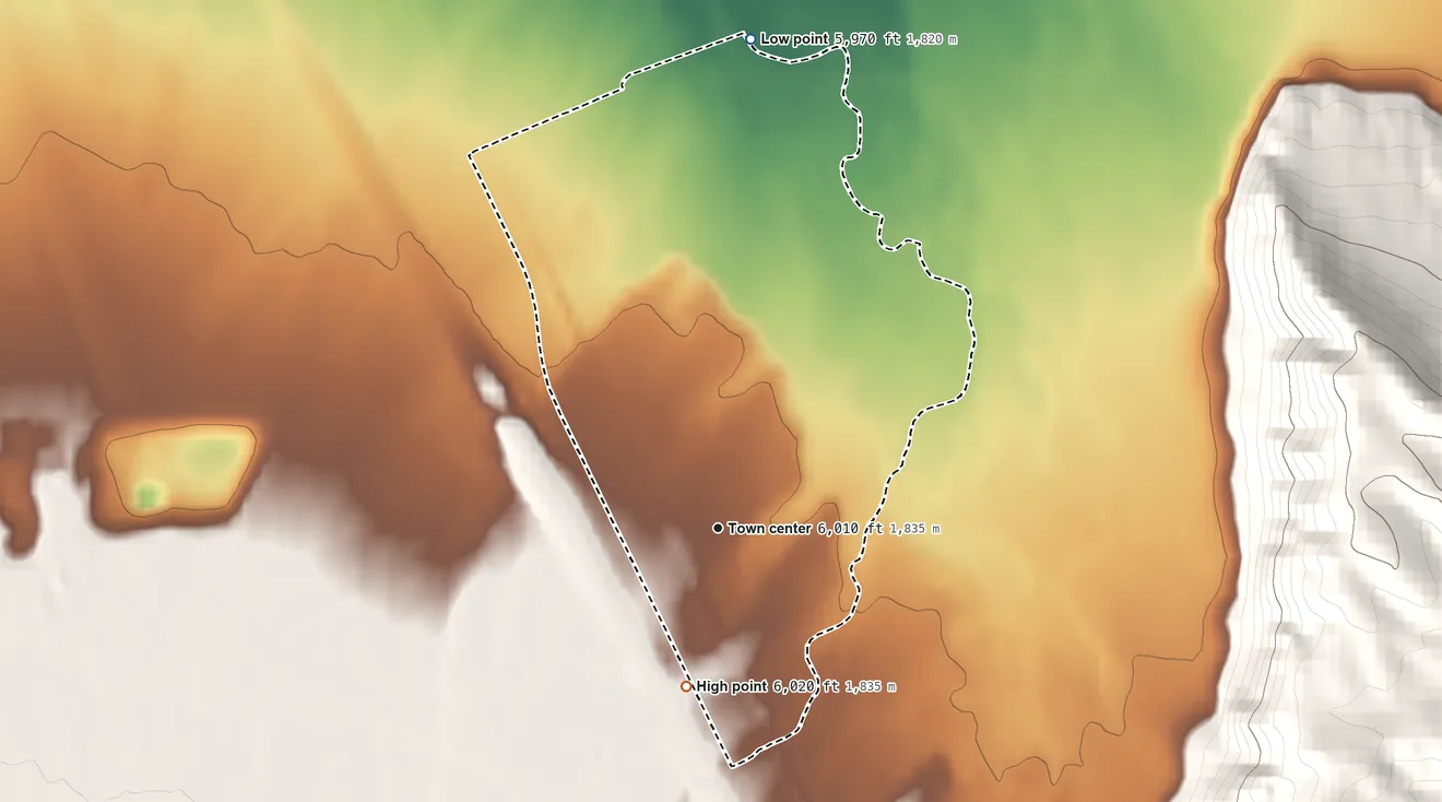 Topographic elevation map of Dell, Montana, shaded from 5,970 ft on the north side to 6,020 ft at the foot of the Tendoy Mountains